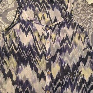 Sheer tank top with brown buttons